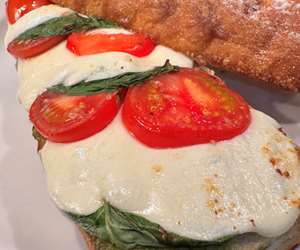 Coming Soon: Caprese Sandwiches! Fresh Mozzarella, Pesto, Tomato & a Balsamic drizzle. Happy summer!