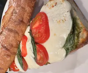 Coming Soon: Caprese Sandwiches! Fresh Mozzarella, Pesto, Tomato & a Balsamic drizzle. Happy summer!