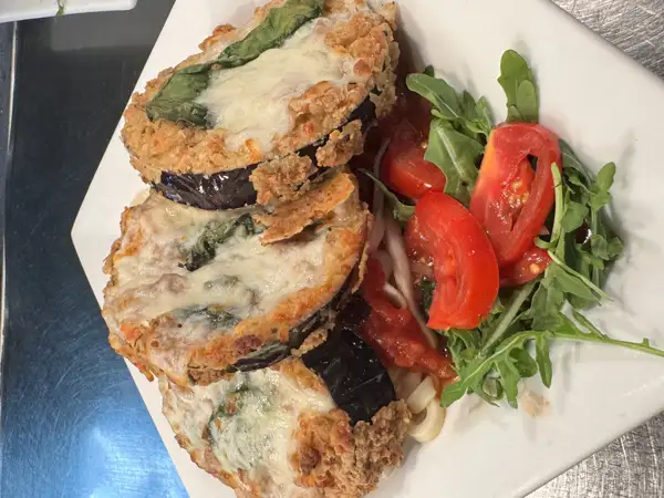 The classic: Eggplant Parmesan, Cut fresh to order