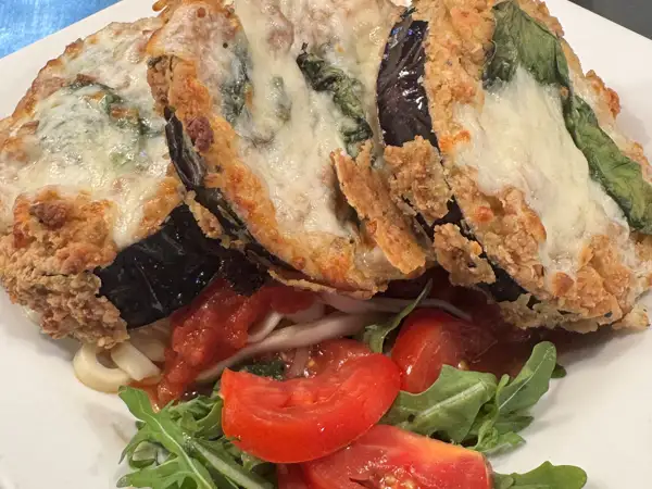 The classic: Eggplant Parmesan, Cut fresh to order