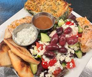 Greek Plate featuring our house-made Fresh Spanakopita. A feta lovers delight!